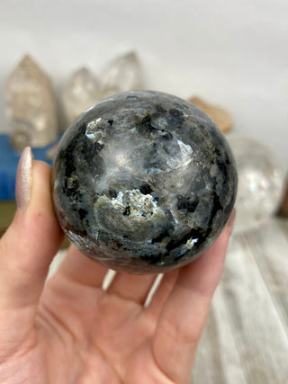 Larvikite Sphere from Curious Muse Crystals Tagged with black, crystal sphere, Feldspar, Grey, larvikite, sphere
