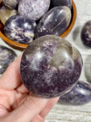Lepidolite with Citrine Palm Stone from Curious Muse Crystals Tagged with carving, citrine, crystal, lepidolite, palm stone, palmstone, polished, purple