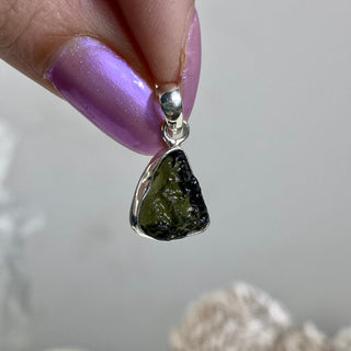 Moldavite in Sterling Silver Pendant | Genuine Tektite from Czech Republic from Curious Muse Crystals Tagged with clear, Crown crystal, crystal jewelry, genuine tektite, green, hide-notify-btn, moldavite, natural moldavite, sterling silver, tektite, Third eye stone, transformation