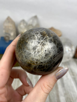 Black Moonstone Sphere | Flashy Orthoclase from Curious Muse Crystals Tagged with black, black moonstone, Crystal healing, genuine crystal, hide-notify-btn, moonstone, orthoclase, silver, sphere