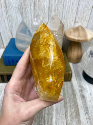 Hematite in Brazilian Quartz Flame | Stunning Inclusions from Curious Muse Crystals Tagged with carving, clear, crystal, hematite, hematite red quartz, hematoid quartz, hide-notify-btn, orange, polished, quartz, yellow