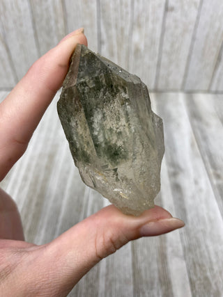 Nirvana Quartz Self Healed Double Termination with Green Chlorite | High-Altitude Himalayan Crystal from Curious Muse Crystals Tagged with chlorite inclusion, clear, green, green Quartz, hand mined crystal, hide-notify-btn, high altitude quartz, High vibration stone, Himalayan Quartz, manifesting Quartz, Nirvana Quartz