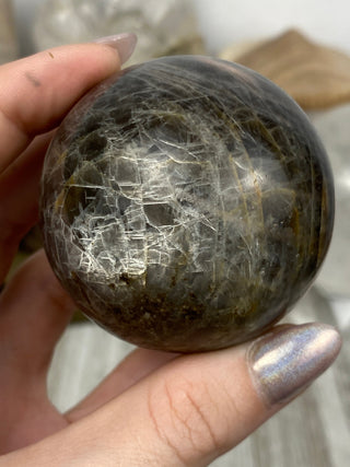 Black Moonstone Sphere | Flashy Orthoclase from Curious Muse Crystals Tagged with black, black moonstone, Crystal healing, genuine crystal, hide-notify-btn, moonstone, orthoclase, silver, sphere
