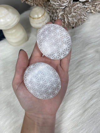 Selenite Etched Flower of Life Palm Stone | Cleansing from Curious Muse Crystals Tagged with aura cleansing, beginner crystal, cleansing, cleansing crystal, clear, crown chakra, crystal healing, crystal magic, energy work, genuine crystal, hand crystal, palm stone, palmstone, polished, selenite, soothing stone, white