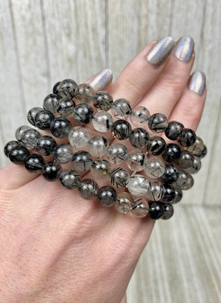 Tourmaline in Quartz 8mm Round Bead Crystal Bracelet from Curious Muse Crystals Tagged with 8mm beads, black, bracelet, clear, crystal jewelry, gemstone bead, gemstone jewelry, healing jewelry, inclusion quartz, tourmaline