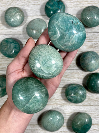 Amazonite Palm Stone from Curious Muse Crystals Tagged with amazonite, blue, carving, crystal, green, palm stone, palmstone, polished