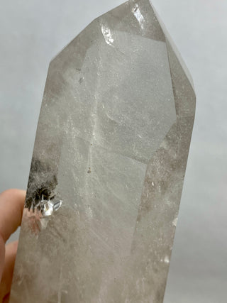 Lemurian Quartz Polished Tower | Rainbow Inclusions | Six Side Generator from Curious Muse Crystals Tagged with clear, clear brazil quartz, clear quartz, Crown crystal, hide-notify-btn, lemurian, lemurian generator, Lemurian Quartz, lemurian seed, quartz, rainbow, sunset mine, tower