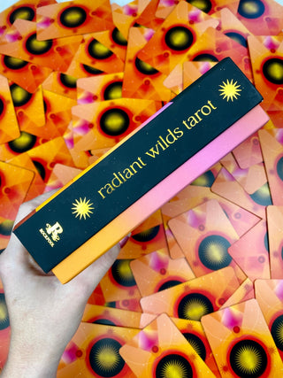 Radiant Wilds Tarot Deck - Desert Dreamscapes - Surrealism Art Divination from Curious Muse Crystals Tagged with alternative tarot, darker art style, desert dream oracle, divination tool, feminine tarot, liminal space tarot, major arcana, minor arcana, surrealism tarot, tarot deck, throat chakra, with guidebook