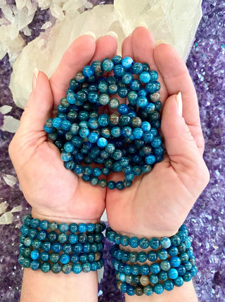 Blue Apatite 8mm Round Bead Bracelet from Curious Muse Crystals Tagged with 6 inch stretch, 8mm bracelet, 8mm gemstone bead, apatite crystal, blue, blue apatite, crystal jewelry, gemstone bracelet, genuine crystal, healing jewelry, natural apatite, stretch bracelet