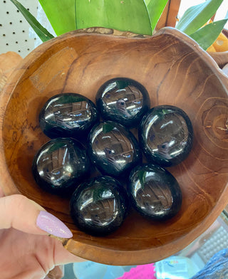 Black Tourmaline Polished Palm Stone from Curious Muse Crystals Tagged with black, black palm stone, black Tourmaline, Brazilian mineral, genuine crystal, grounding stone, mental stress, natural mineral, palmstone, pocket crystal, protection crystal, reiki crystal, shadow work, tourmaline