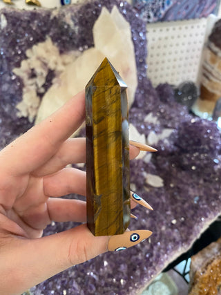 Tigers Eye Six Sided Tower - Confidence and Protection from Curious Muse Crystals Tagged with abundance stone, aura cleansing, brown, confidence, confidence crystal, crystal healing, crystal magic, Crystal tower, energy work, genuine crystal, protection, root chakra, solar plexus chakra, tigers eye, tower, yellow