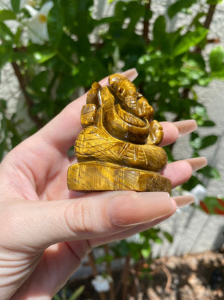 Tigers Eye Ganesha Hand-carved in Kathmandu, Nepal from Curious Muse Crystals Tagged with brown, confidence stone, crystal carving, crystal ganesha, ganesh statue, hand carved idol, healing crystal, high vibration, hindu god, obstacle breaker, reiki work, road opener, tiger eye, tiger eye ganesha, yellow