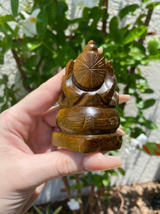Tigers Eye Ganesha Hand-carved in Kathmandu, Nepal from Curious Muse Crystals Tagged with brown, confidence stone, crystal carving, crystal ganesha, ganesh statue, hand carved idol, healing crystal, high vibration, hindu god, obstacle breaker, reiki work, road opener, tiger eye, tiger eye ganesha, yellow
