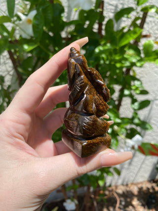 Tigers Eye Ganesha Hand-carved in Kathmandu, Nepal from Curious Muse Crystals Tagged with brown, confidence stone, crystal carving, crystal ganesha, ganesh statue, hand carved idol, healing crystal, high vibration, hindu god, obstacle breaker, reiki work, road opener, tiger eye, tiger eye ganesha, yellow
