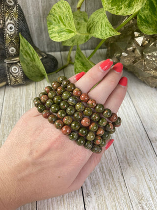 Unakite 8mm Round Bead Crystal Bracelet - Harmony & Alignment from Curious Muse Crystals Tagged with 8mm beads, balance stone, bracelet, crystal bracelet, crystal jewelry, epidote, gemstone bead, gemstone jewelry, green, healing jewelry, heart chakra, heart healing, natural crystal, pink, pink orthoclase, unakite, Unakite jewelry