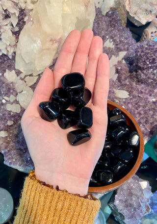 Obsidian Tumbled Stone - Protection from Curious Muse Crystals Tagged with black, black crystal, black obsidian, crystal for jewelry, Crystal healing, genuine crystal, lava glass, obsidian, obsidian tumble, protection charm, tumbled stone
