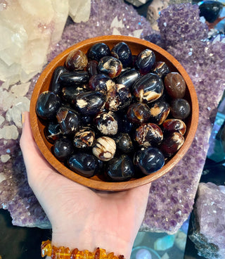 Zebra Amber Tumbled Stone - Balance & Clarity from Curious Muse Crystals Tagged with amber, amber and calcite, brown, Crystal healing, fossilized amber, genuine crystal, hide-notify-btn, high vibrational, mineral specimen, pain relief, real amber, reiki work, tumbled stone, uv reactive, zebra amber