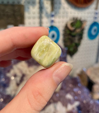 Serpentine Tumbled Stone- Infinite - Manifestation and Wealth from Curious Muse Crystals Tagged with Crystal healing, genuine crystal, green, hearth chakra, infinite, light green stone, manifestation, mineral collection, natural mineral, prosperity wealth, reiki healing, serpentine, tumbled stone