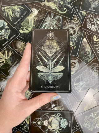 Talisman Oracle Deck - Sigil & Sacred Geometry Divination - Black Gilded Edge Cards from Curious Muse Crystals Tagged with alternative tarot, black and gold cards, dark animal oracle, dark style tarot, divination tool, gilded tarot, oracle card deck, sacred geometry, sigil making kit, talisman oracle, talisman sigils, with guidebook