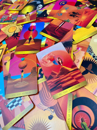 Radiant Wilds Tarot Deck - Desert Dreamscapes - Surrealism Art Divination from Curious Muse Crystals Tagged with alternative tarot, darker art style, desert dream oracle, divination tool, feminine tarot, liminal space tarot, major arcana, minor arcana, surrealism tarot, tarot deck, throat chakra, with guidebook