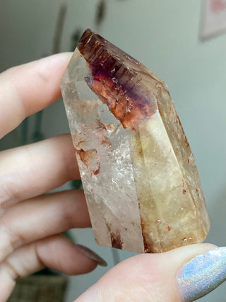 Dreamcoat Lemurian Generator - Polished Brazilian Tower Crystal from Curious Muse Crystals Tagged with clear, clear brazil quartz, dreamcoat lemurian, goethite rutile, hematite amethyst, hide-notify-btn, lemurian, lemurian generator, lemurian seed, purple, red, secondary growth, super seven, synergy seven, yellow
