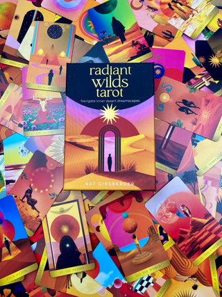 Radiant Wilds Tarot Deck - Desert Dreamscapes - Surrealism Art Divination from Curious Muse Crystals Tagged with alternative tarot, darker art style, desert dream oracle, divination tool, feminine tarot, liminal space tarot, major arcana, minor arcana, surrealism tarot, tarot deck, throat chakra, with guidebook