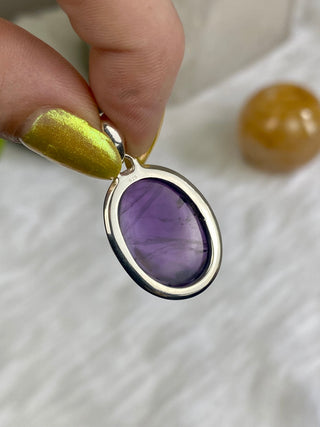 Amethyst in Sterling Silver Pendant from Curious Muse Crystals Tagged with amethyst, crystal energy, Crystal Jewelry, extra dark amethyst, hide-notify-btn, purple, reiki healing, silver crystal jewel, sterling silver, witchy jewelry