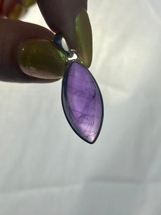Amethyst in Sterling Silver Pendant from Curious Muse Crystals Tagged with amethyst, crystal energy, Crystal Jewelry, extra dark amethyst, hide-notify-btn, purple, reiki healing, silver crystal jewel, sterling silver, witchy jewelry