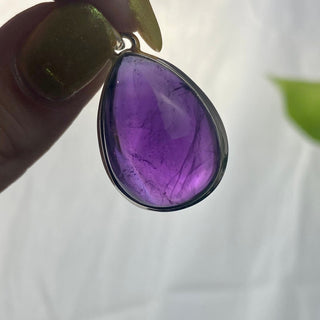 Amethyst in Sterling Silver Pendant from Curious Muse Crystals Tagged with amethyst, crystal energy, Crystal Jewelry, extra dark amethyst, hide-notify-btn, purple, reiki healing, silver crystal jewel, sterling silver, witchy jewelry