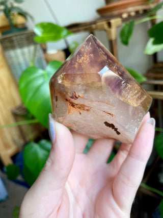Dreamcoat Lemurian Generator - Polished Brazilian Tower Crystal from Curious Muse Crystals Tagged with clear, clear brazil quartz, dreamcoat lemurian, goethite rutile, hematite amethyst, hide-notify-btn, lemurian, lemurian generator, lemurian seed, purple, red, secondary growth, super seven, synergy seven, yellow
