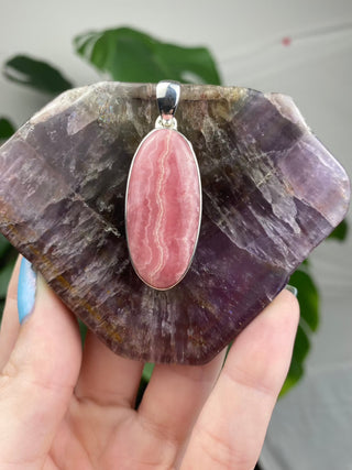 Rhodochrosite in Sterling Silver Pendant from Curious Muse Crystals Tagged with crystal energy, Crystal Jewelry, hide-notify-btn, pink, reiki healing, rhodochrosite, silver crystal jewel, sterling silver, witchy jewelry
