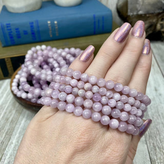 Kunzite Round Bead Crystal Bracelet from Curious Muse Crystals Tagged with 8mm beads, bracelet, crystal jewelry, gemstone bead, gemstone jewelry, healing jewelry, kunzite, pink