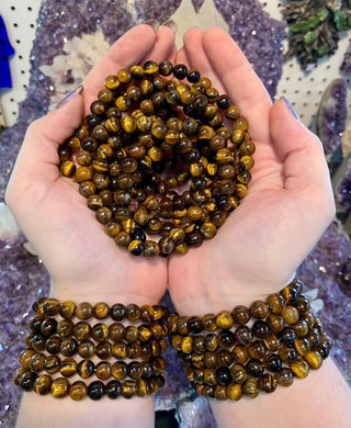 Tiger’s Eye 8mm Round Bead Crystal Bracelet - Confidence & Personal Power from Curious Muse Crystals Tagged with 8mm beads, bracelet, brown, crystal jewelry, gemstone bead, gemstone jewelry, healing jewelry, hide-notify-btn, tigers eye, yellow