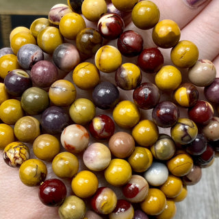 Mookaite Jasper 8mm Round Bead Crystal Bracelet from Curious Muse Crystals Tagged with 8mm beads, bracelet, crystal jewelry, gemstone bead, gemstone jewelry, healing jewelry, jasper, mookaite, purple, red, yellow