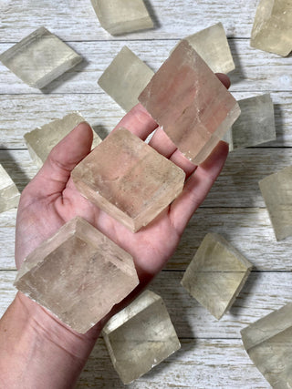 Yellow Optical Calcite Cubes from Curious Muse Crystals for 14. Tagged with calcite, clear, crystal, genuine crystal, optical calcite, raw, raw mineral, yellow