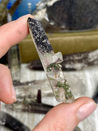 Quartz with Hematite and Lithium inclusions | Afghanistan from Curious Muse Crystals Tagged with Afghanistan, hematite, hematite red quartz, Laser quartz, lithium, Lithium quartz, Specular hematite