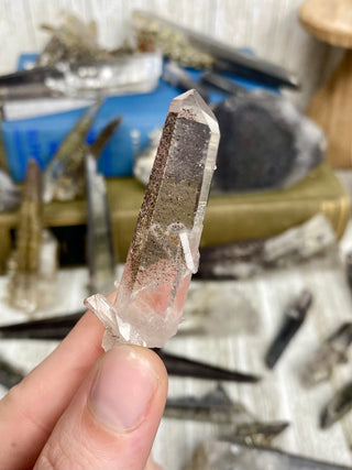 Quartz with Hematite and Lithium inclusions | Afghanistan from Curious Muse Crystals Tagged with Afghanistan, hematite, hematite red quartz, Laser quartz, lithium, Lithium quartz, Specular hematite