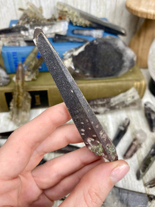 Quartz with Hematite and Lithium inclusions | Afghanistan from Curious Muse Crystals Tagged with Afghanistan, hematite, hematite red quartz, Laser quartz, lithium, Lithium quartz, Specular hematite