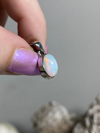 Welo Opal in Sterling Silver Pendant from Curious Muse Crystals Tagged with crystal healing, Crystal Jewelry, energy work, Ethiopian opal, flashy opal, hide-notify-btn, october crystal, opal crystal pendant, rainbow, reiki crystal, Sterling, sterling silver, Welo Opal, white opal pendant, witchy jewelry