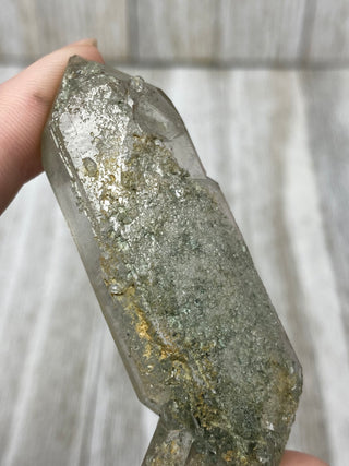 Nirvana Quartz Double Termination with Green Chlorite | High-Altitude Himalayan Crystal from Curious Muse Crystals Tagged with chlorite inclusion, clear, green, green Quartz, hand mined crystal, hide-notify-btn, high altitude quartz, High vibration stone, Himalayan Quartz, manifesting Quartz, Nirvana Quartz