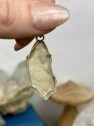 Libyan Desert Glass in Sterling Silver Pendant from Curious Muse Crystals Tagged with desert glass, hide-notify-btn, libya, necklace, Pendant, sterling silver, tektite, yellow