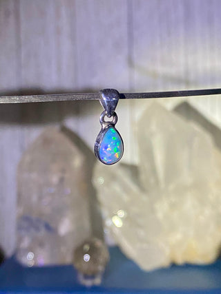 Welo Opal in Sterling Silver Pendant from Curious Muse Crystals Tagged with crystal healing, Crystal Jewelry, energy work, Ethiopian opal, flashy opal, hide-notify-btn, october crystal, opal crystal pendant, rainbow, reiki crystal, Sterling, sterling silver, Welo Opal, white opal pendant, witchy jewelry