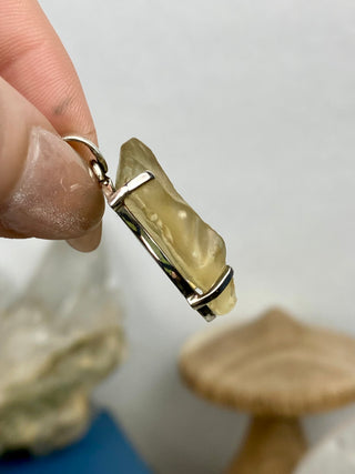 Libyan Desert Glass in Sterling Silver Pendant from Curious Muse Crystals Tagged with desert glass, hide-notify-btn, libya, necklace, Pendant, sterling silver, tektite, yellow