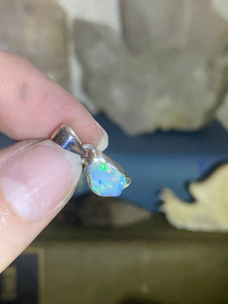 Welo Opal Raw Form in Sterling Silver Pendant from Curious Muse Crystals Tagged with crystal healing, Crystal Jewelry, energy work, Ethiopian opal, flashy opal, hide-notify-btn, october crystal, opal crystal pendant, rainbow, reiki crystal, Sterling, sterling silver, Welo Opal, white opal pendant, witchy jewelry