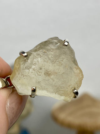 Libyan Desert Glass in Sterling Silver Pendant from Curious Muse Crystals Tagged with desert glass, hide-notify-btn, libya, necklace, Pendant, sterling silver, tektite, yellow