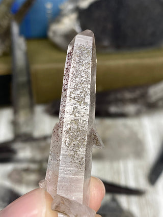 Quartz with Hematite and Lithium inclusions | Afghanistan from Curious Muse Crystals Tagged with Afghanistan, hematite, hematite red quartz, Laser quartz, lithium, Lithium quartz, Specular hematite