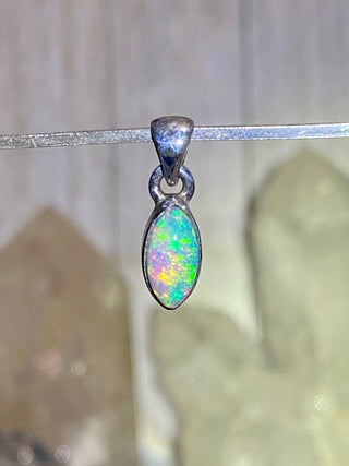 Welo Opal in Sterling Silver Pendant from Curious Muse Crystals Tagged with crystal healing, Crystal Jewelry, energy work, Ethiopian opal, flashy opal, hide-notify-btn, october crystal, opal crystal pendant, rainbow, reiki crystal, Sterling, sterling silver, Welo Opal, white opal pendant, witchy jewelry