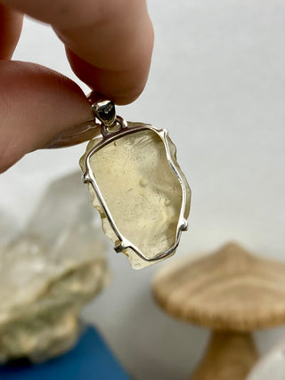Libyan Desert Glass in Sterling Silver Pendant from Curious Muse Crystals Tagged with desert glass, hide-notify-btn, libya, necklace, Pendant, sterling silver, tektite, yellow