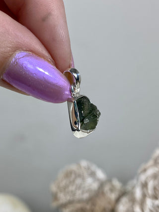 Moldavite in Sterling Silver Pendant | Genuine Tektite from Czech Republic from Curious Muse Crystals Tagged with clear, Crown crystal, crystal jewelry, genuine tektite, green, hide-notify-btn, moldavite, natural moldavite, sterling silver, tektite, Third eye stone, transformation