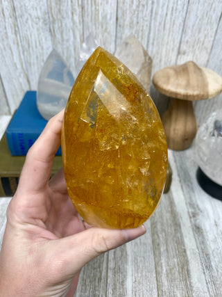 Hematite in Quartz Flame | Stunning Inclusions from Curious Muse Crystals Tagged with carving, clear, crystal, hematite, hematite red quartz, hematoid quartz, hide-notify-btn, orange, polished, quartz, yellow